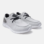 Light grey mid-top sneakers by bugatti with dark laces, patterned lining, and comfortable white soles.