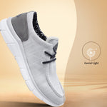 Grey mid top sneaker by bugatti, with a suede heel and knit upper.
