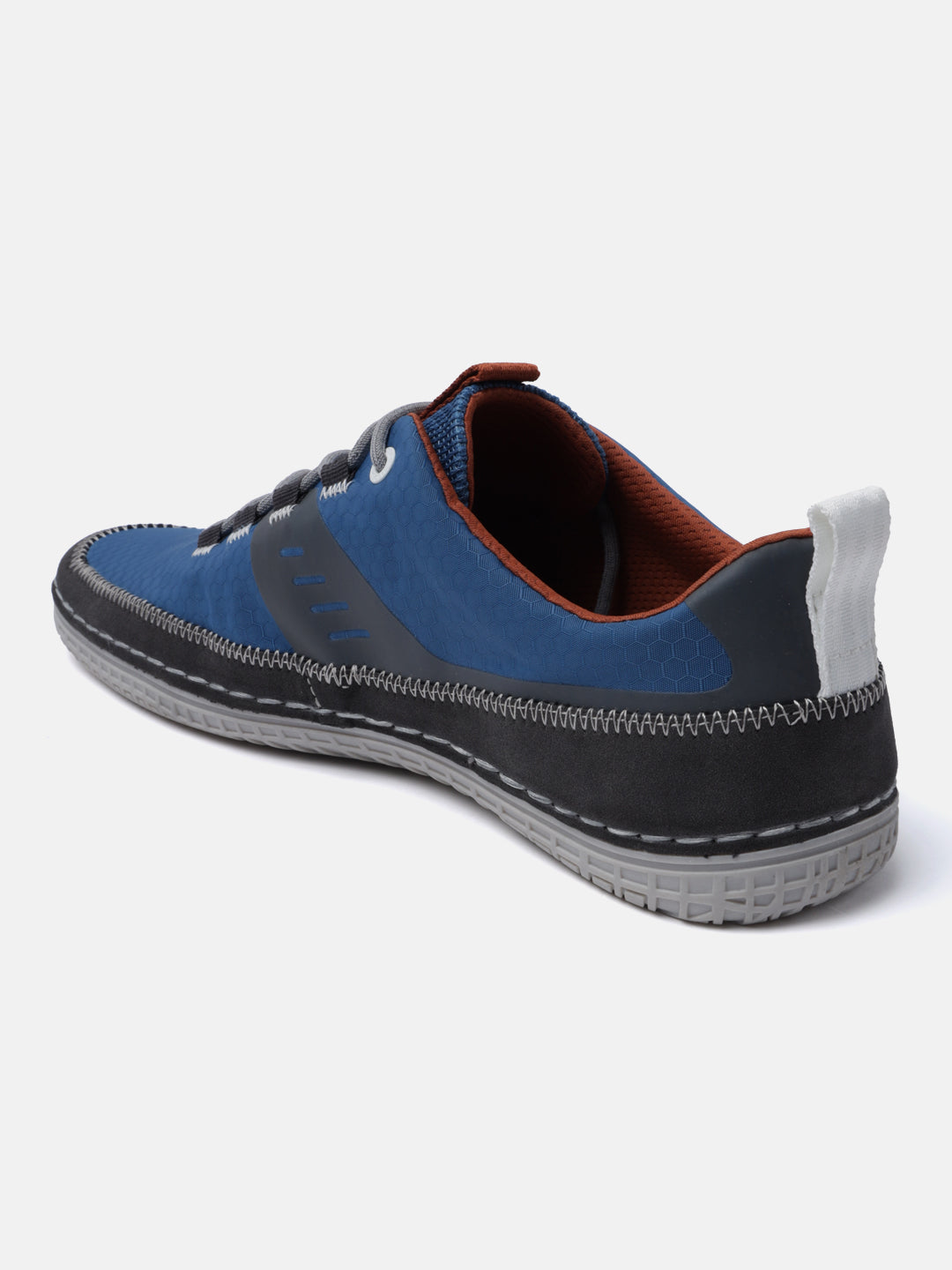 Blue low-top comfort sneakers by bugatti with gray and black accents, and a honeycombed texture.