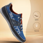 Blue comfort low-top sneaker by bugatti, with visible stitching, a contrasting dark heel and a ridged sole.
