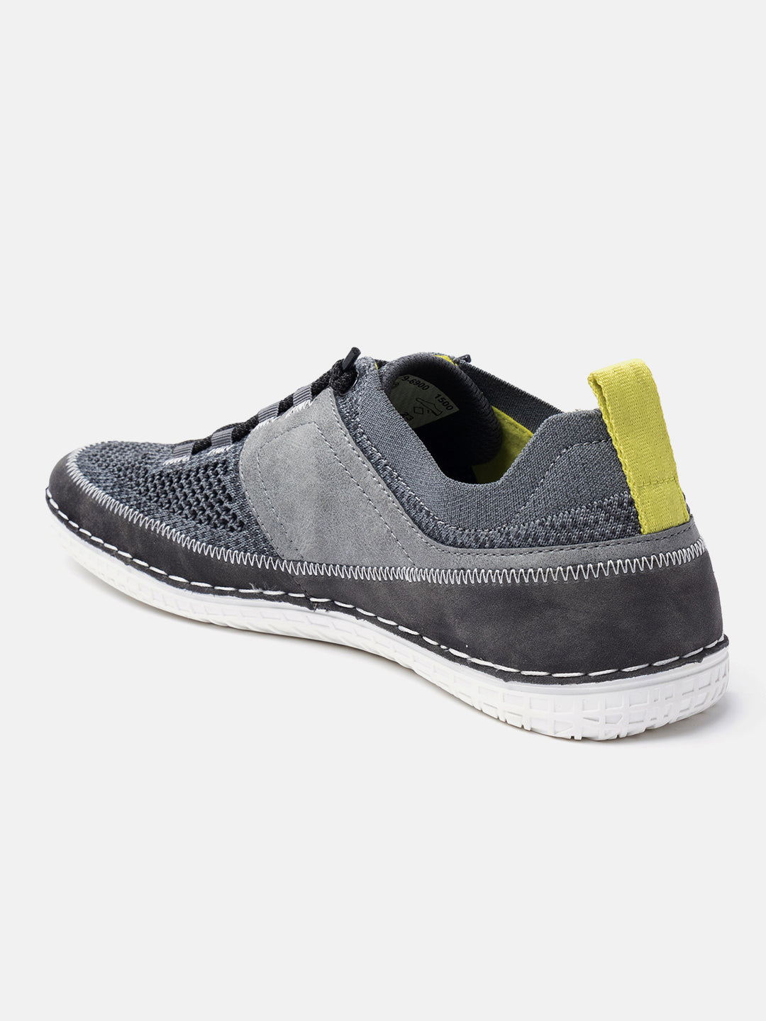 Grey comfort low top sneakers by bugatti, with a suede and knit upper and yellow pull tab at the heel.