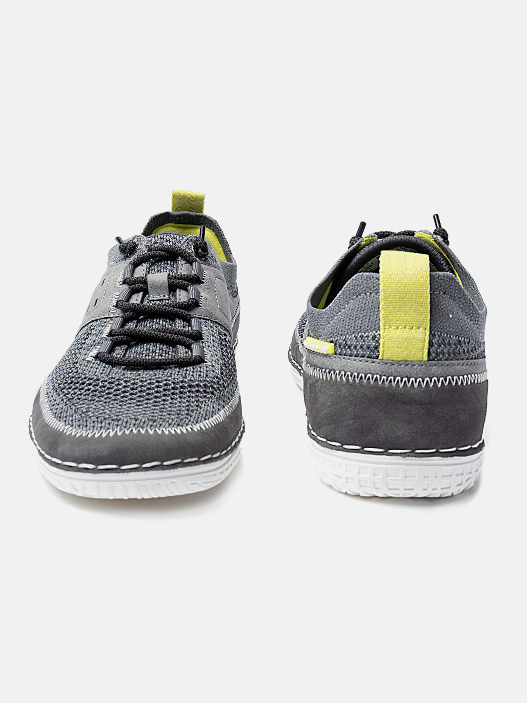 Grey knit low-top sneakers by bugatti, featuring black bungee laces, grey accents, and a white sole.