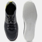 Grey comfort low-top sneakers by bugatti showing a textured upper and patterned sole.