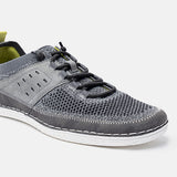 Grey comfort low top sneakers by bugatti, featuring a mesh upper and bungee lacing.