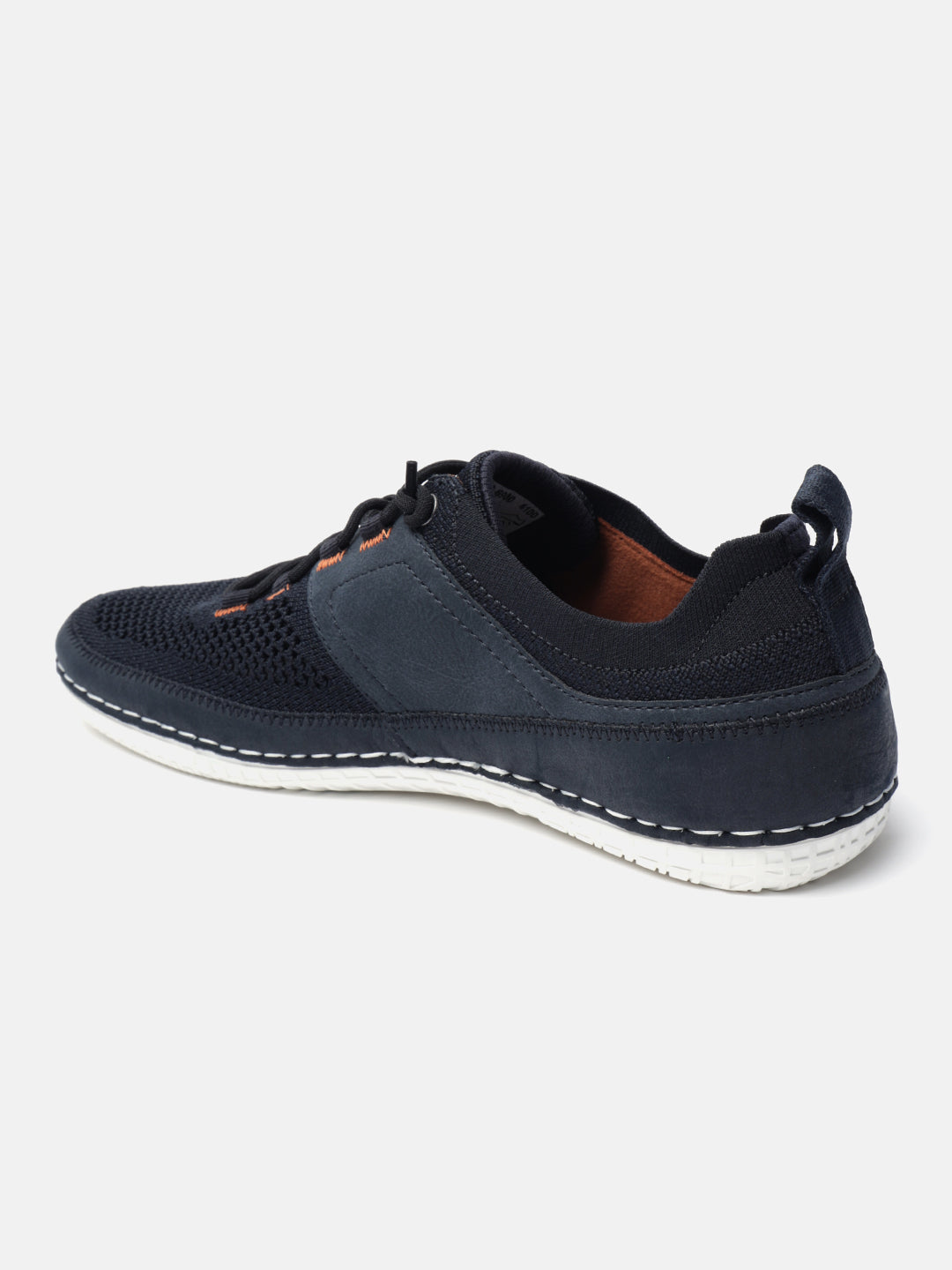 Dark blue comfort low top sneakers by bugatti with white stitching details along the sole.