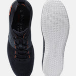 Dark blue Bimini low-top sneakers by bugatti with orange accents and a white textured sole.