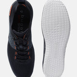 Dark blue Bimini low-top sneakers by bugatti with orange accents and a white textured sole.