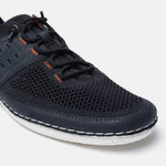 Dark blue comfort low-top sneakers by bugatti, with a breathable mesh upper and decorative white stitching.