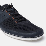Dark blue comfort low-top sneakers by bugatti, with a breathable mesh upper and decorative white stitching.