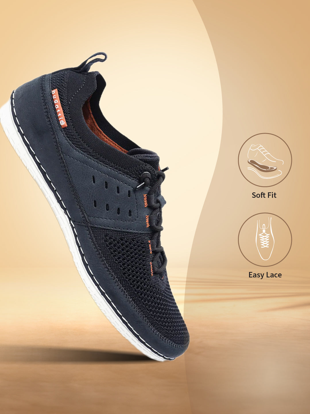 Dark blue low top sneaker by bugatti, shown in a three-quarters view, with orange accent stitching.