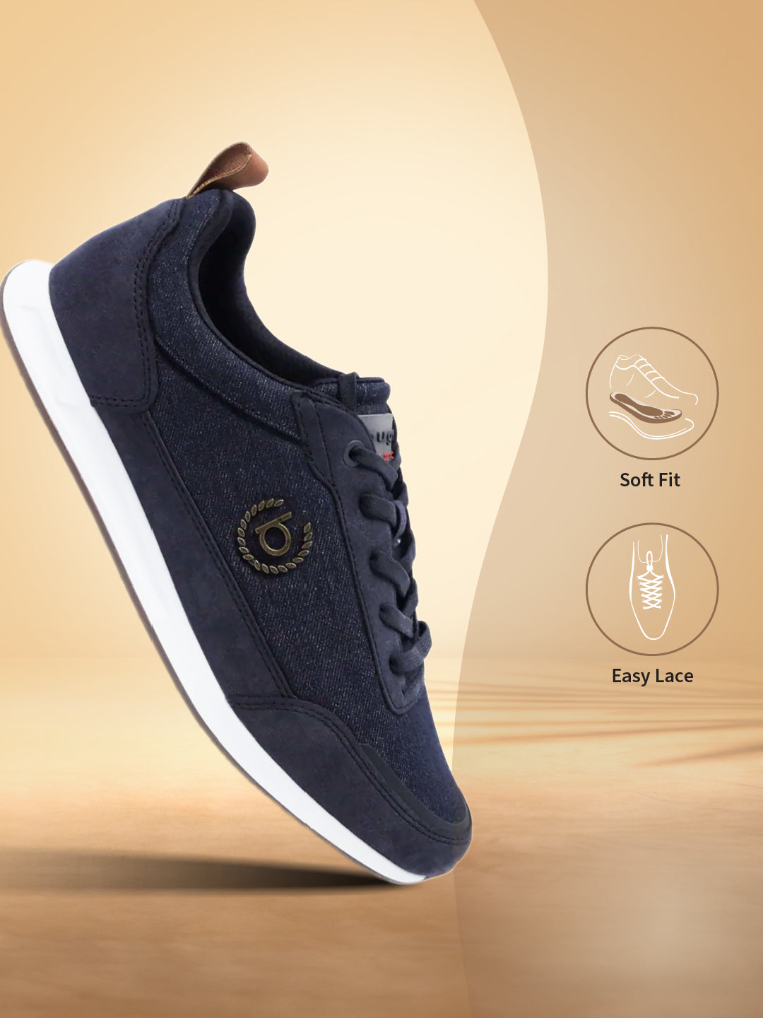 Dark blue sneakers by bugatti, with a white sole and a brown leather heel tab.