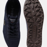 Dark blue mid-top sneakers by bugatti, featuring a textured outsole and lace-up design.