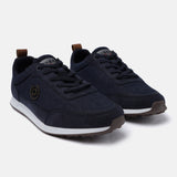 Dark blue denim sneakers by bugatti, featuring brown heel tabs, textured overlays, and white midsoles.