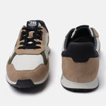 Beige casual sneakers by bugatti with black accents and suede texture.