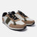 Beige comfort mid top sneakers by bugatti with white, brown, and olive green accents.