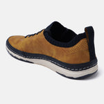 Yellow comfort low top sneakers by bugatti with perforated detail and contrasting sole.