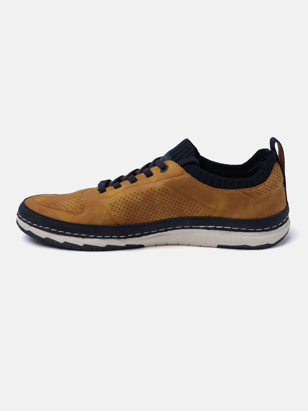 Yellow comfort low top sneakers by bugatti, with perforated upper and dark blue sock-style collar.