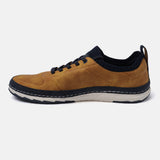 Yellow comfort low top sneakers by bugatti, with perforated upper and dark blue sock-style collar.
