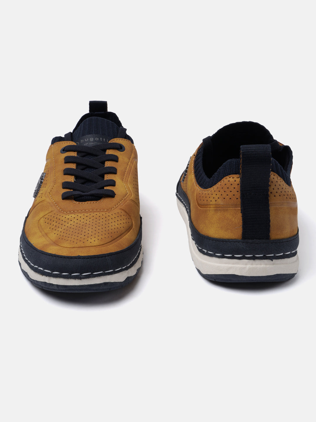 Yellow low-top sneakers by bugatti featuring dark laces and a white and blue layered sole.