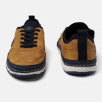 Yellow low-top sneakers by bugatti featuring dark laces and a white and blue layered sole.