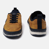 Yellow low-top sneakers by bugatti featuring dark laces and a white and blue layered sole.