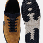 Yellow comfort sneakers by bugatti, shown with navy blue shoelaces and a patterned sole.
