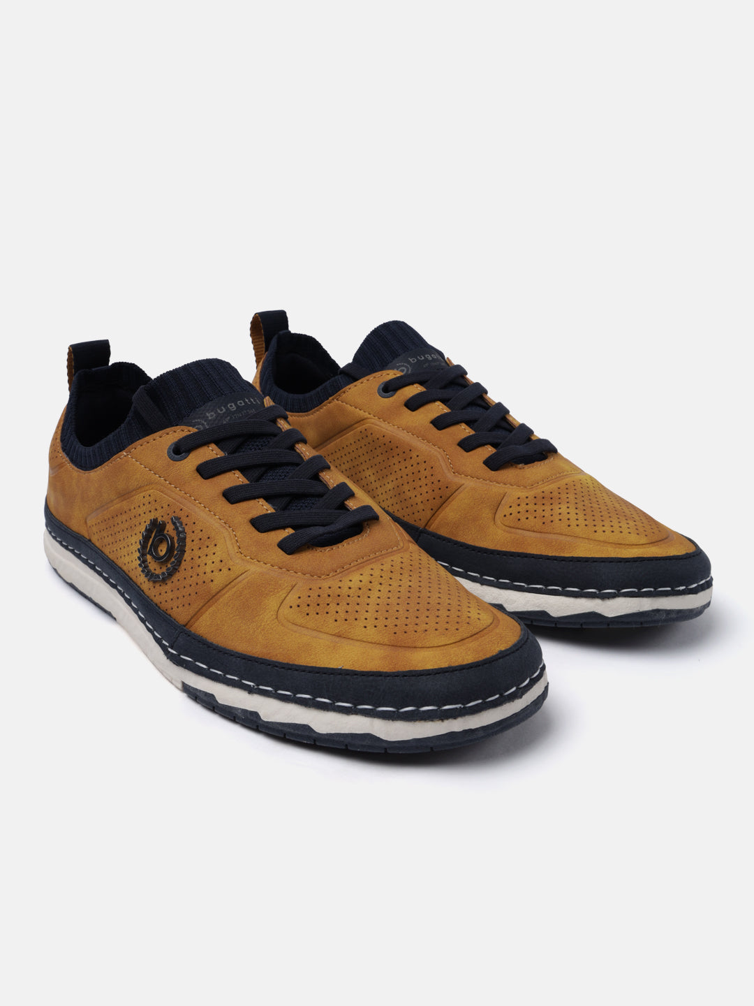 Yellow comfort low top sneakers by bugatti featuring navy sock liner, matching laces, and decorative stitch accents.
