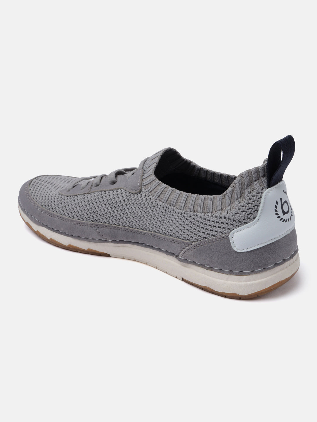 Grey comfort low top sneakers by bugatti with a knitted texture, suede accents, and back pull tab.