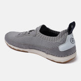 Grey comfort low top sneakers by bugatti with a knitted texture, suede accents, and back pull tab.