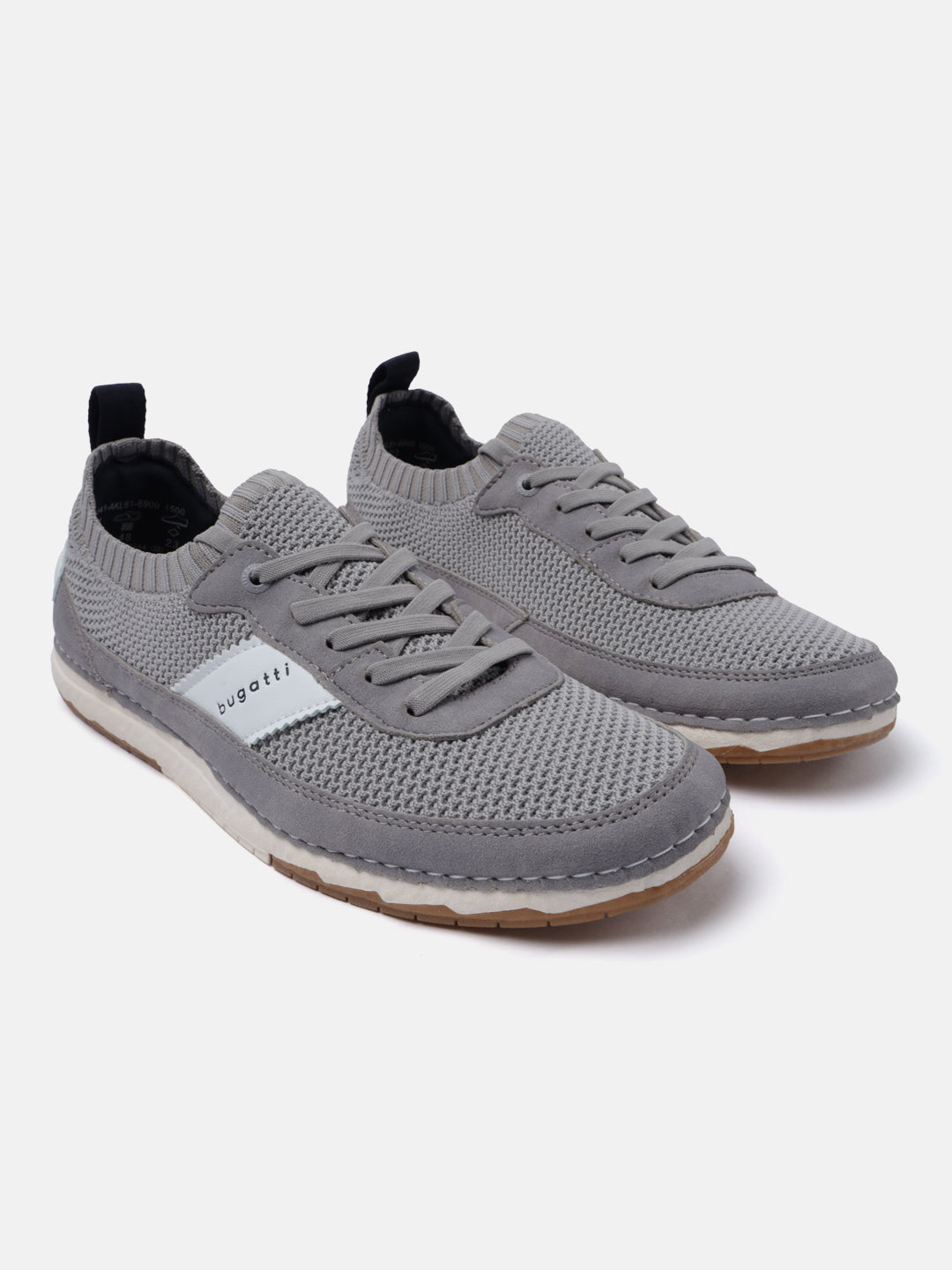 Gray knit low top sneakers by bugatti with suede trim and brown rubber outsoles.