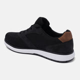 Black comfort sneakers by bugatti with brown accent at the heel.