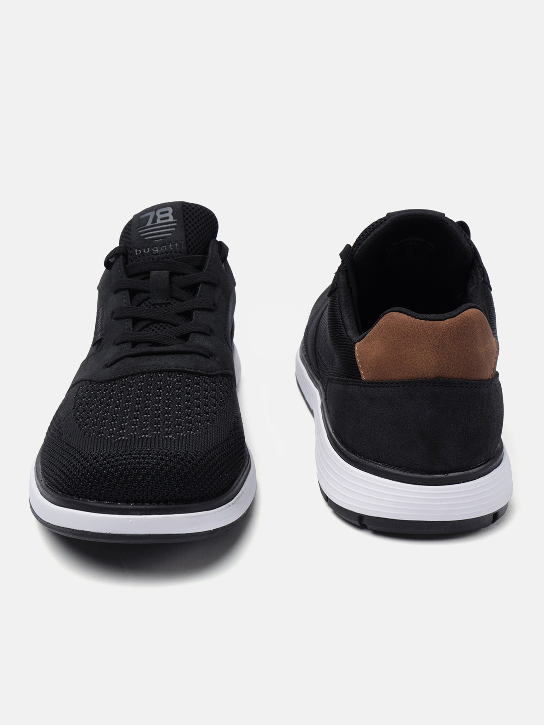 Black comfort sneakers by Bugatti with a brown heel accent and white sole.