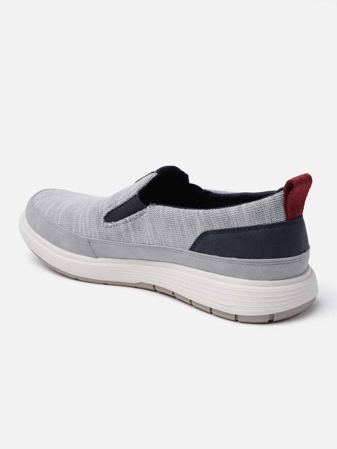 A grey Men's bugatti Casual Loafers featuring a round plain toe, zero heels heel. Made from synthetic with a durable eva outsole, this slip-on design offers both style and comfort.