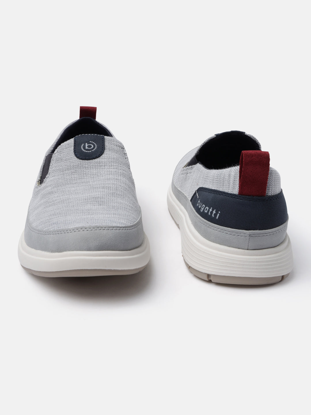 A grey Men's bugatti Casual Loafers featuring a round plain toe, zero heels heel. Made from synthetic with a durable eva outsole, this slip-on design offers both style and comfort.