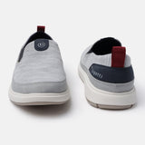 A grey Men's bugatti Casual Loafers featuring a round plain toe, zero heels heel. Made from synthetic with a durable eva outsole, this slip-on design offers both style and comfort.
