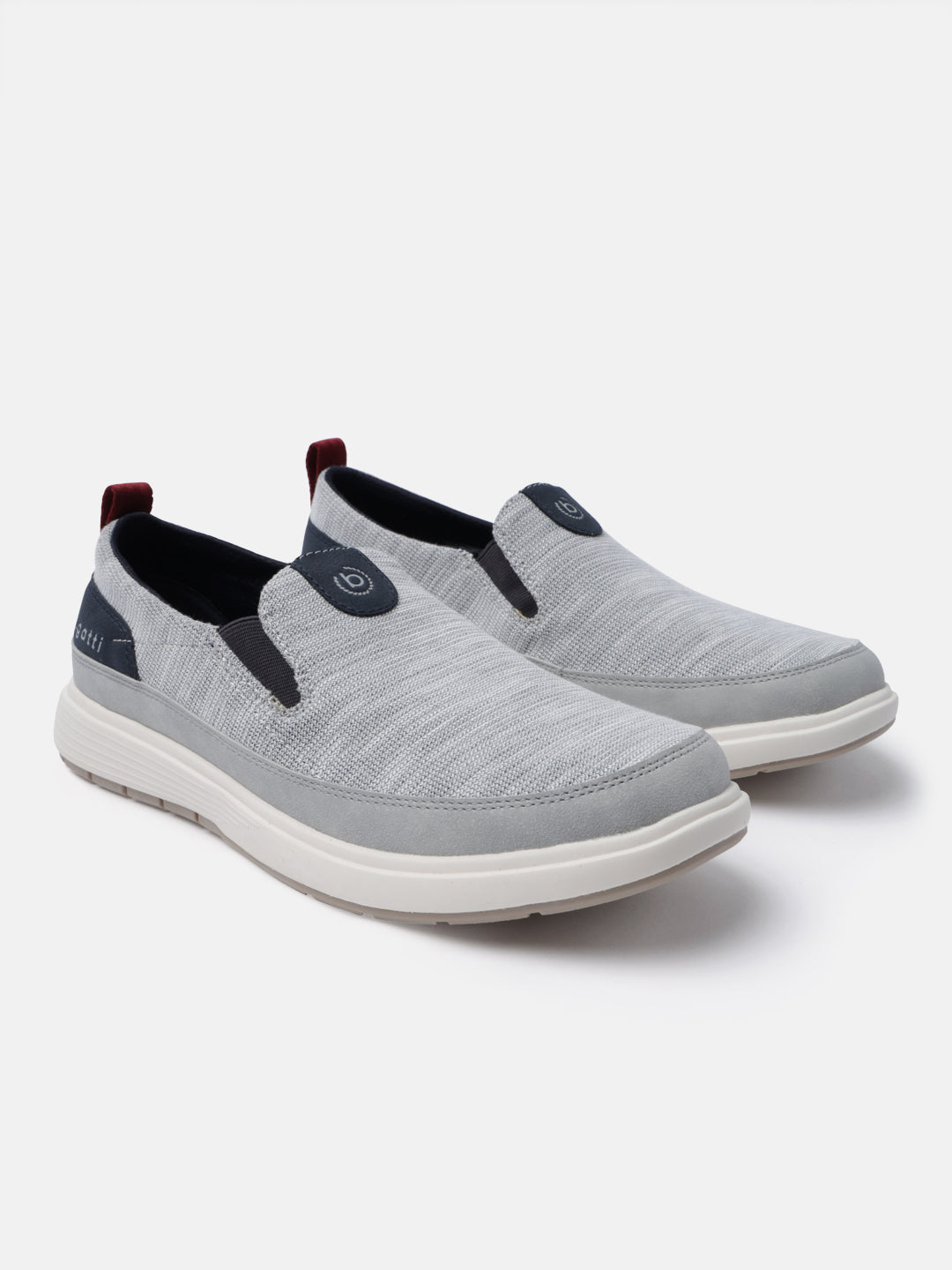 A grey Men's bugatti Casual Loafers featuring a round plain toe, zero heels heel. Made from synthetic with a durable eva outsole, this slip-on design offers both style and comfort.