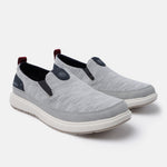 A grey Men's bugatti Casual Loafers featuring a round plain toe, zero heels heel. Made from synthetic with a durable eva outsole, this slip-on design offers both style and comfort.