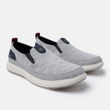 A grey Men's bugatti Casual Loafers featuring a round plain toe, zero heels heel. Made from synthetic with a durable eva outsole, this slip-on design offers both style and comfort.