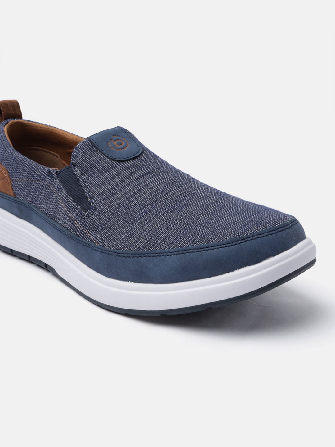 A blue Men's bugatti Casual Loafers featuring a round plain toe, zero heels heel. Made from synthetic with a durable eva outsole, this slip-on design offers both style and comfort.