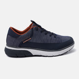 Dark blue sneaker by bugatti with navy accents, brown lining, and white and black sole, in a side view.