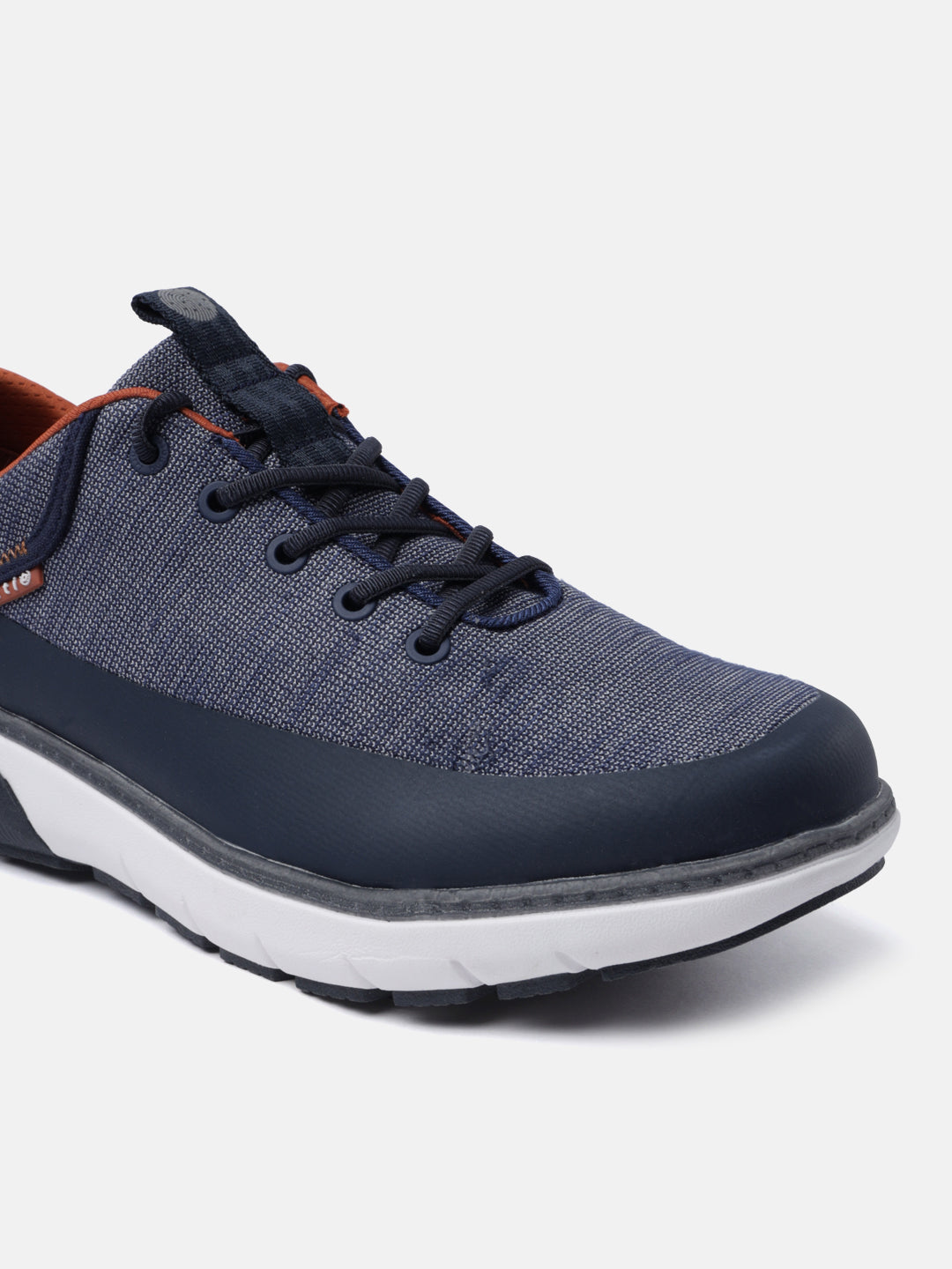 Dark blue comfort sneakers by bugatti with visible black laces and a white sole.