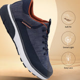 Dark blue comfort sneakers by bugatti with orange interior, white midsoles, and black soles.