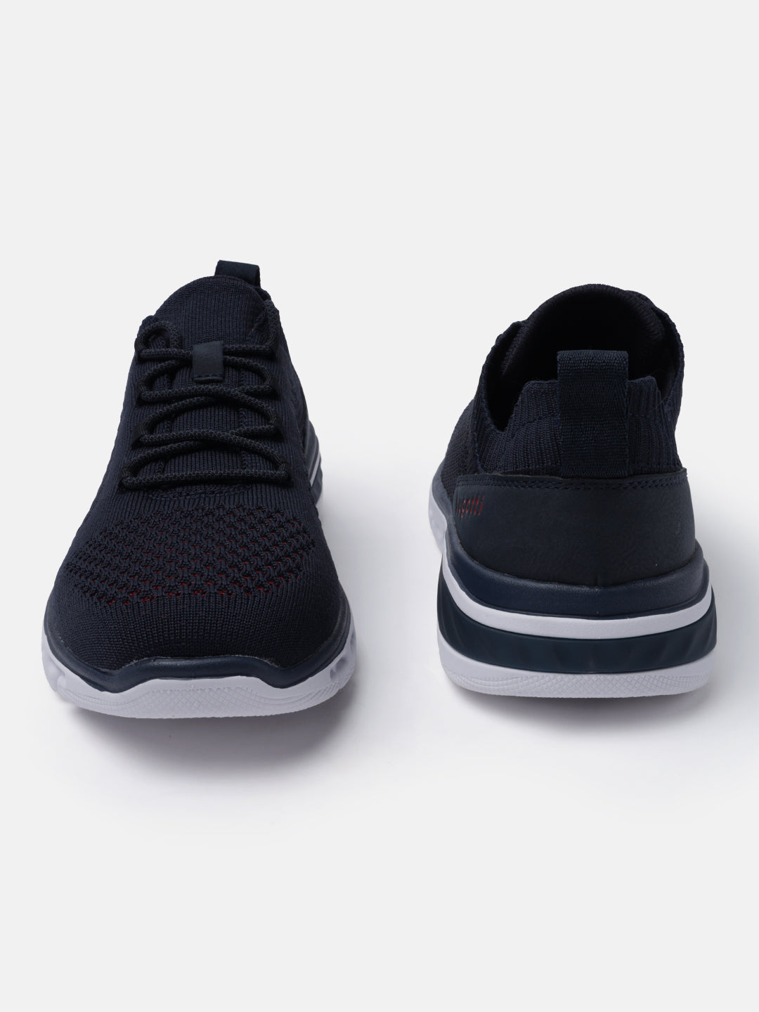 Dark blue comfort sneakers by bugatti, featuring knit uppers with lace-up closure and a white sole.