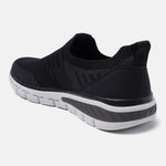 Black comfort sneakers by bugatti with knit texture, white and grey sole.