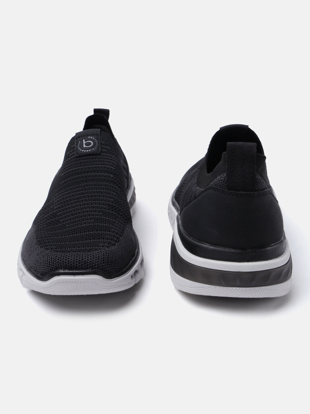 Black comfort sneakers by bugatti with a knit texture and a white sole.