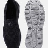 Black comfort sneakers by bugatti, featuring a knit upper and a patterned rubber sole.