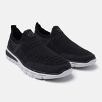 Black comfort sneakers by bugatti featuring a breathable knit texture and contrasting white sole.