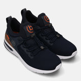 Dark blue athleisure sneakers by bugatti, featuring orange logo accents and a white sole.