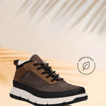Multicolor casual comfort boot by Bugatti, with black laces, white midsole, and a foliage shadow.