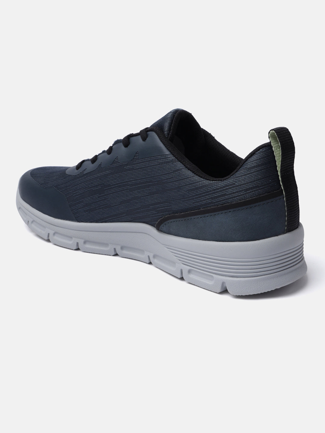 Blue comfort sneaker by bugatti with a textured design and grey midsole, shown in a back angle view.